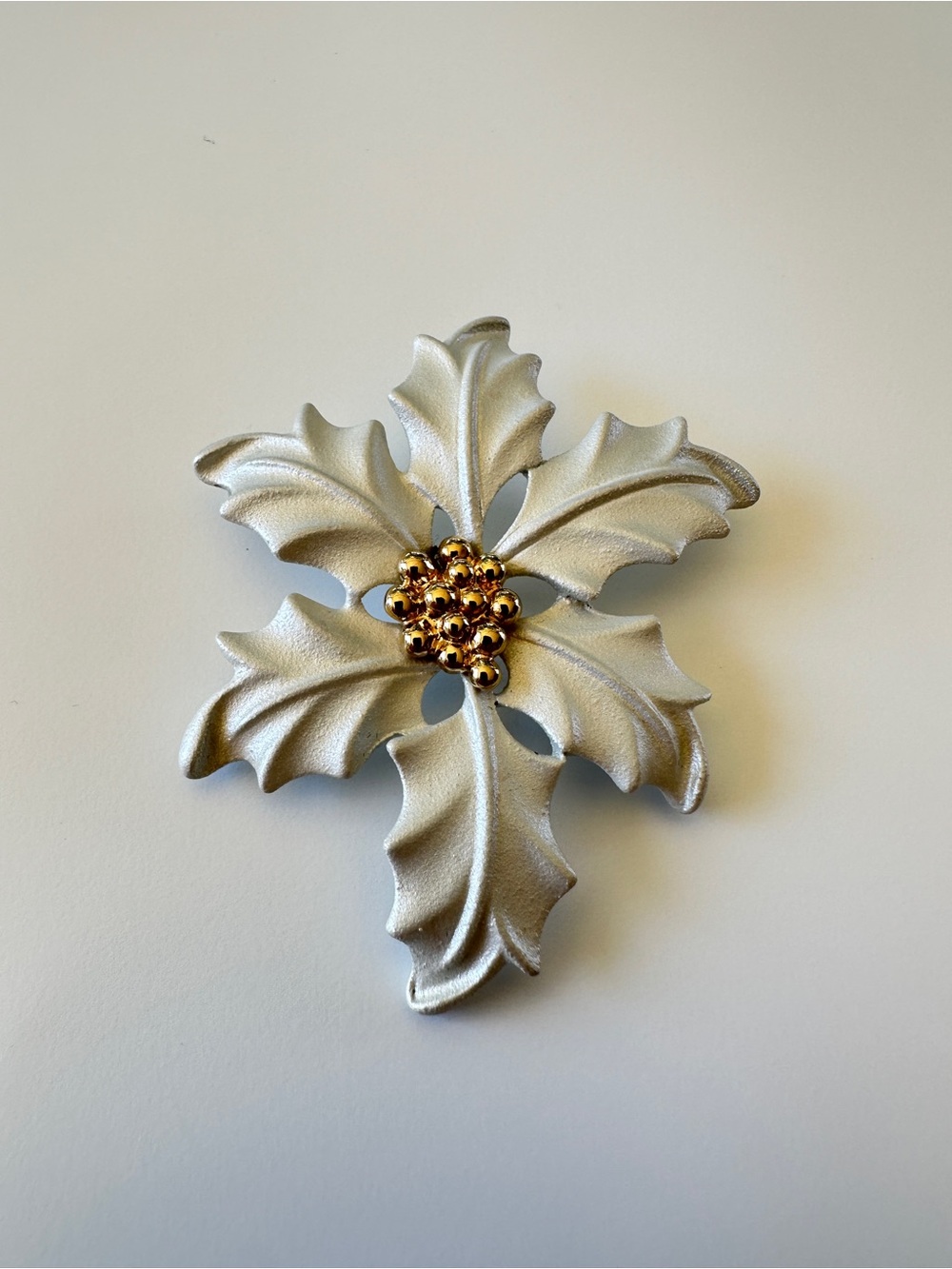 Vintage poinsettia flower brooch with gold tone accent beads